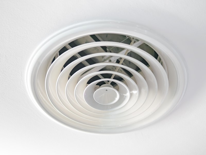 Image shows what looks like a white extractor fan