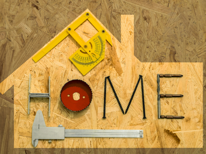 Image shows constructing materials used to spell out home
